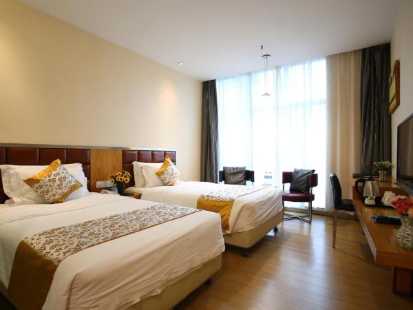 Landscape Fashion Hotel Guangzhou East Station : photo 1 de la chambre chambre lits jumeaux standard
