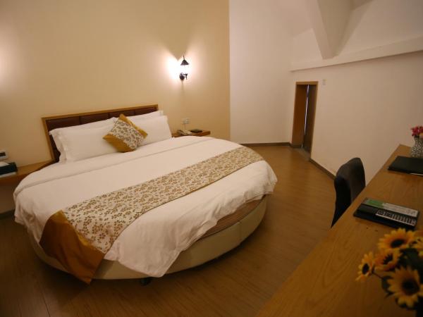 Landscape Fashion Hotel Guangzhou East Station : photo 3 de la chambre chambre exécutive lit queen-size