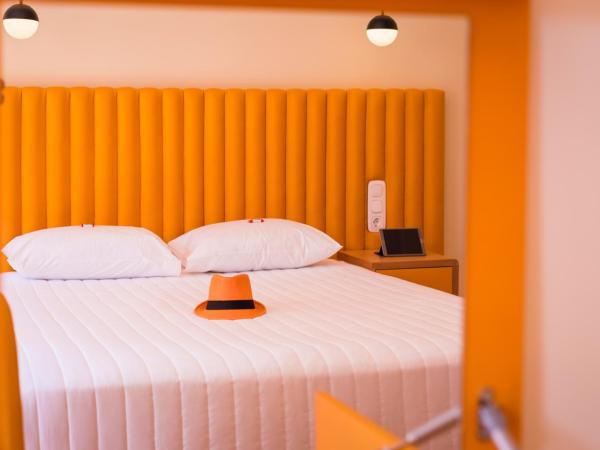 TheJoy City Suites : photo 2 de la chambre  chambre double supérieure avec balcon