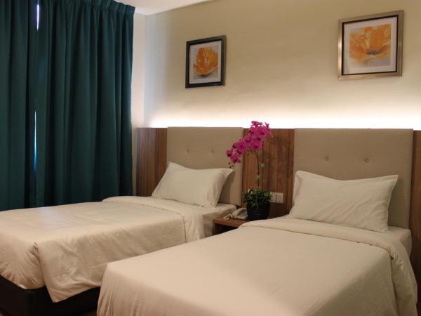 BIG M Hotel : photo 3 de la chambre chambre lits jumeaux supérieure avec fenêtre