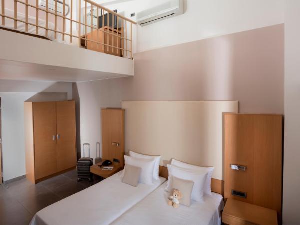 Elite City Resort : photo 5 de la chambre maisonette familiale - vue sur jardin