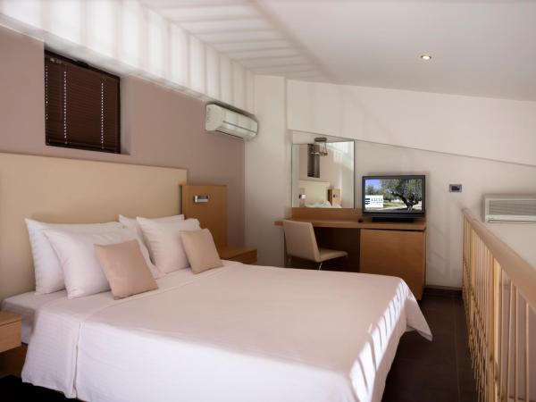 Elite City Resort : photo 3 de la chambre maisonette familiale - vue sur jardin