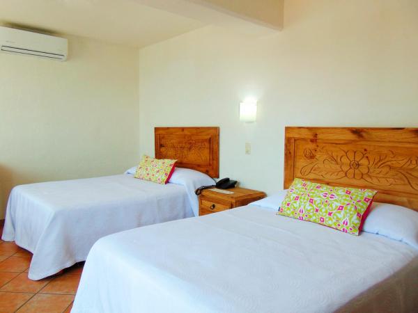 Hotel El Pescador : photo 9 de la chambre chambre double standard avec 2 lits doubles