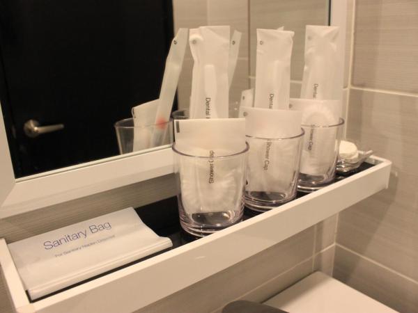 BIG M Hotel : photo 1 de la chambre hébergement familial triple de luxe