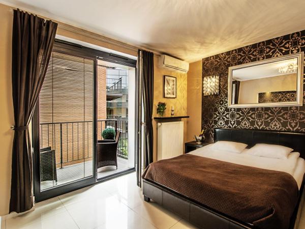 Angel City Center Krakow Aparthotel : photo 1 de la chambre appartement de luxe climatisé