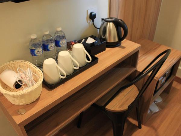 BIG M Hotel : photo 3 de la chambre hébergement familial triple de luxe