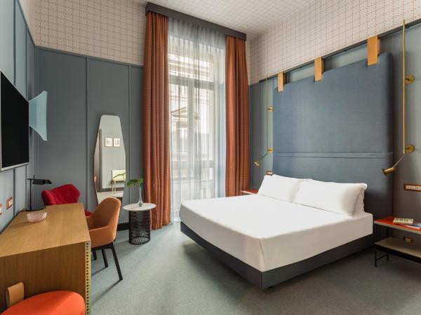 Room Mate Giulia : photo 10 de la chambre chambre double ou lits jumeaux supérieure