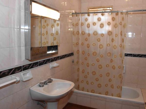 Residencial El Hogar : photo 1 de la chambre chambre lits jumeaux