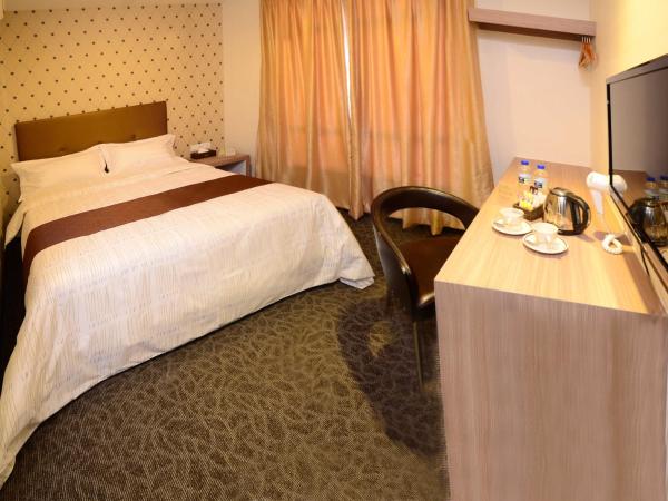 Hotel Nusa CT : photo 1 de la chambre chambre supérieure lit queen-size