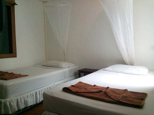 Tropical Garden Bungalow : photo 2 de la chambre chambre lits jumeaux standard avec ventilateur