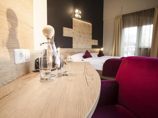 Amalienburg - Boutique & Boarding Hotel : photo 1 de la chambre chambre triple confort