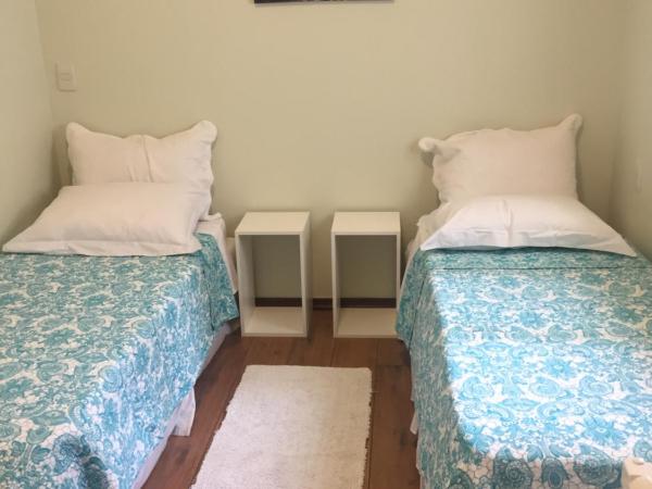 Vila Stellino Suítes : photo 1 de la chambre chambre lits jumeaux