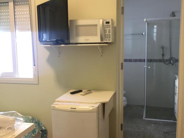 Vila Stellino Suítes : photo 2 de la chambre chambre lits jumeaux