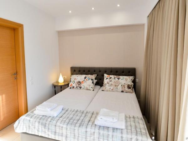 Island Dreams Rooms & Suites : photo 4 de la chambre chambre double ou lits jumeaux exécutive