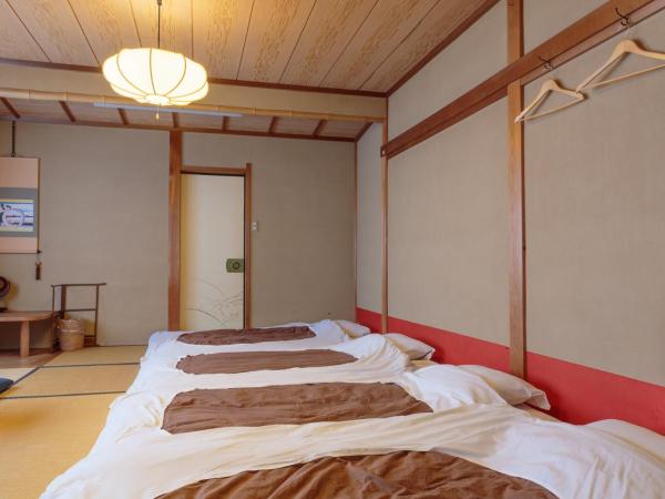 Gion Ryokan Q-beh : photo 4 de la chambre chambre de style japonais avec salle d'eau privative – vue sur jardin
