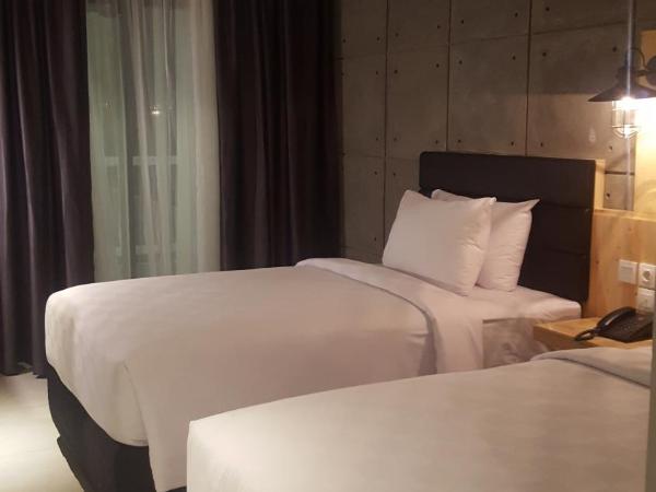 Ayaartta Hotel Malioboro : photo 4 de la chambre chambre double ou lits jumeaux deluxe avec balcon