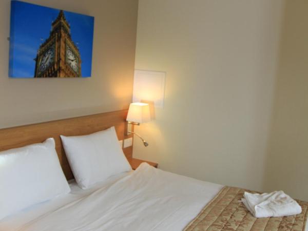 Kings Cross Inn Hotel : photo 4 de la chambre chambre double