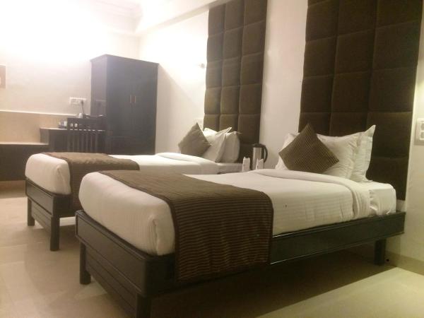 Chandra Inn : photo 9 de la chambre chambre deluxe double ou lits jumeaux