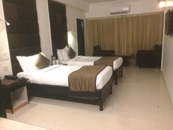 Chandra Inn : photo 4 de la chambre chambre deluxe double ou lits jumeaux