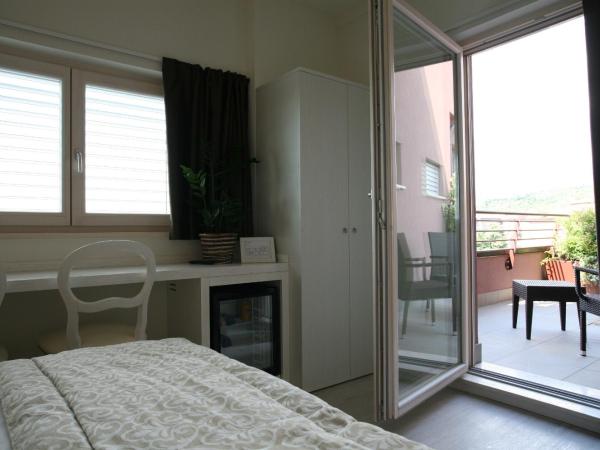 Nuova Opera Rooms : photo 3 de la chambre chambre triple avec balcon