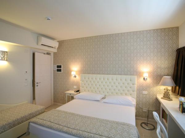 Nuova Opera Rooms : photo 4 de la chambre chambre triple avec balcon