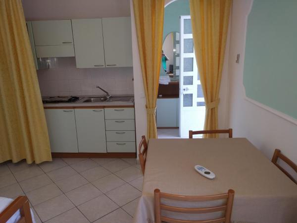 Residence Giardino del Sole : photo 9 de la chambre studio