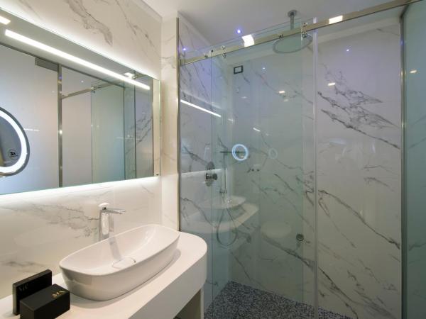 Mia Boutique Hotel : photo 10 de la chambre appartement supérieur avec baignoire spa