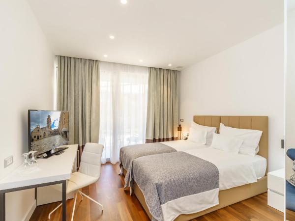 Rooms Oasis Life : photo 4 de la chambre chambre lits jumeaux deluxe avec terrasse