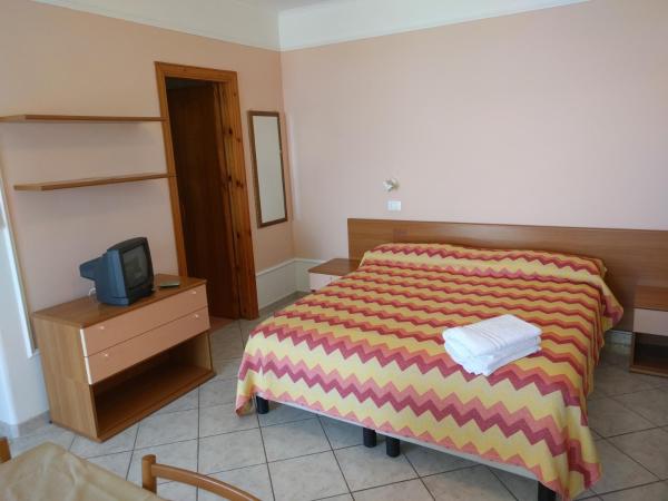 Residence Giardino del Sole : photo 4 de la chambre studio familial