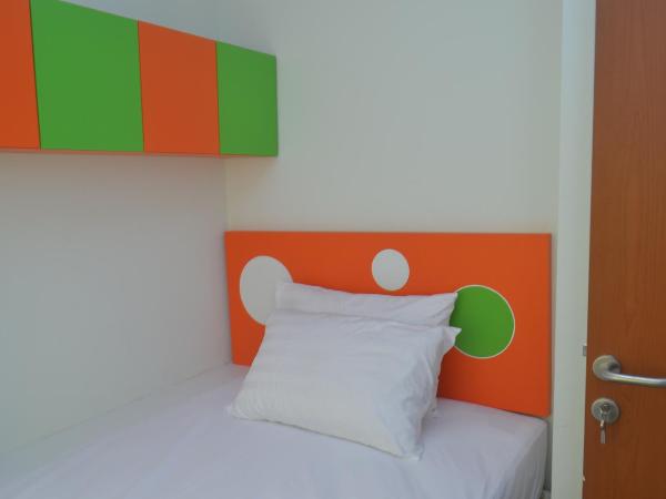 Titanium Express HomTel : photo 3 de la chambre chambre familiale supérieure