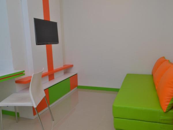 Titanium Express HomTel : photo 4 de la chambre chambre familiale supérieure