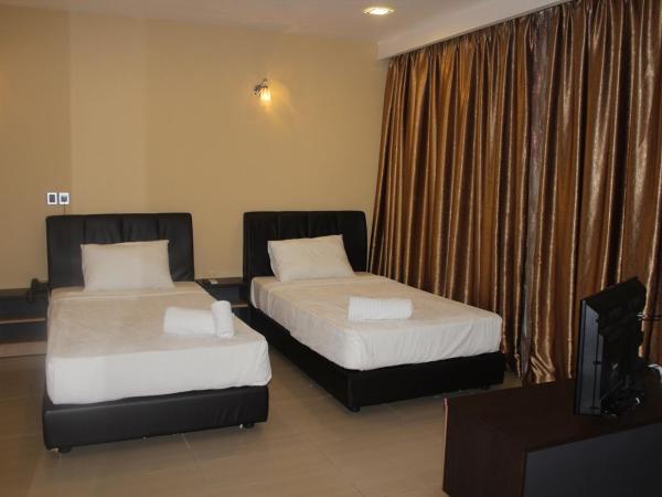 T Hotel Jalan Tar : photo 3 de la chambre chambre double ou lits jumeaux supérieure