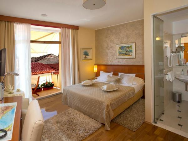 Royal Suites : photo 1 de la chambre chambre double supérieure avec balcon