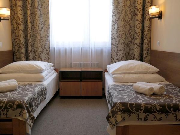 Ośrodek SCSK Optima : photo 1 de la chambre chambre lits jumeaux