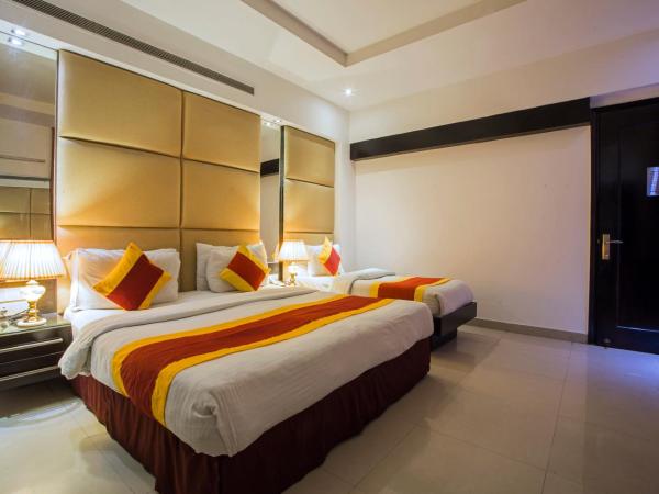 Hotel Krishna - By RCG Hotels : photo 2 de la chambre chambre triple premium