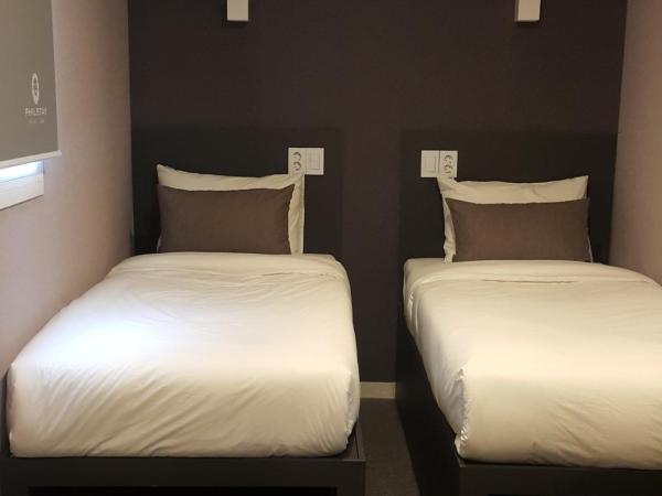 Philstay Myeongdong Metro : photo 8 de la chambre chambre lits jumeaux