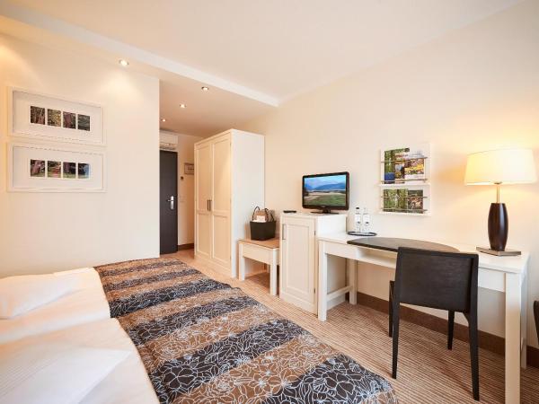 Hotel Munte am Stadtwald : photo 4 de la chambre chambre double standard