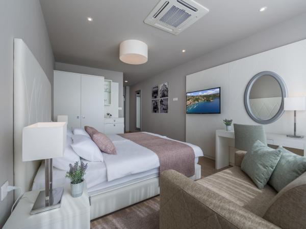 Apartments & Rooms Preelook : photo 5 de la chambre chambre double deluxe