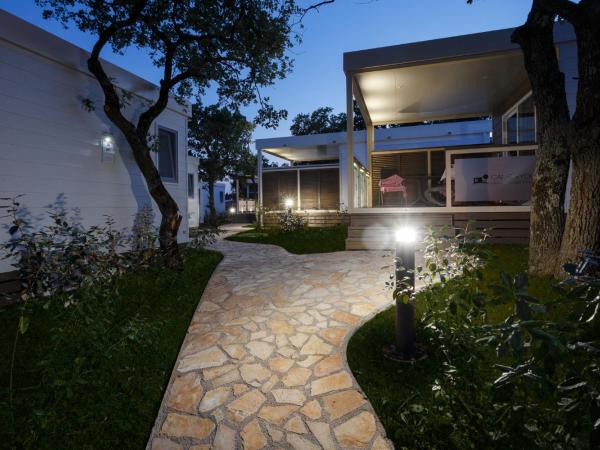 Mobile Homes - FKK Nudist Camping Solaris : photo 9 de la chambre mobile home 1 chambre avec terrasse