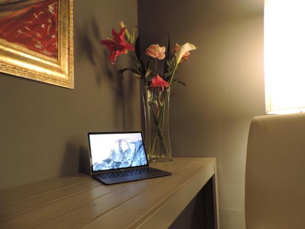 Corridoni Suites : photo 5 de la chambre chambre double supérieure - vue sur jardin