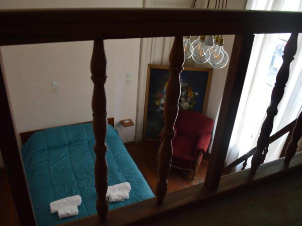 High Hostel Rosario : photo 7 de la chambre chambre triple avec salle de bains privative