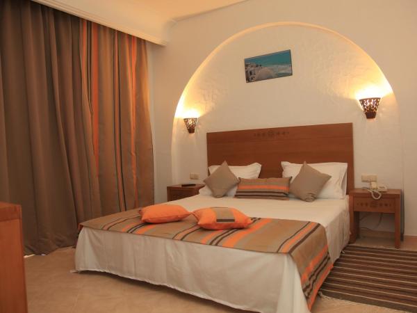 Hotel Menara : photo 1 de la chambre chambre triple