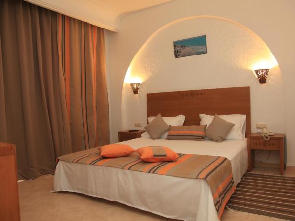 Hotel Menara : photo 3 de la chambre chambre triple