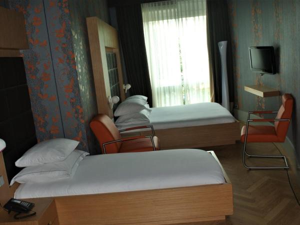 Amadi Park Hotel : photo 2 de la chambre chambre triple