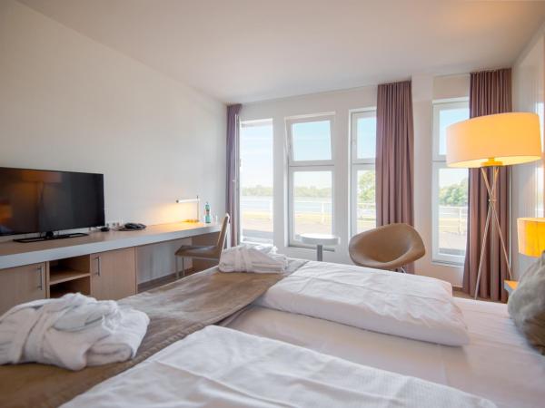 Aspria Hannover : photo 5 de la chambre chambre double ou lits jumeaux - vue sur lac
