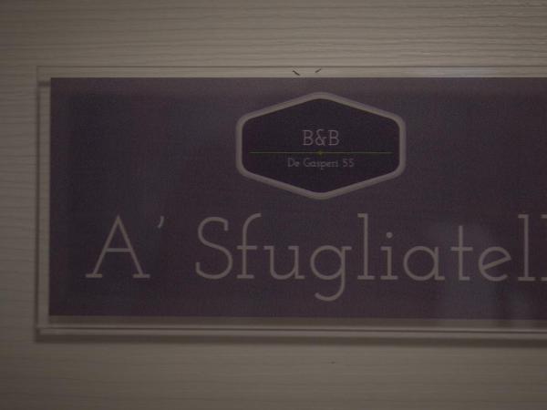 De Gasperi 55 : photo 1 de la chambre chambre lit queen-size avec balcon