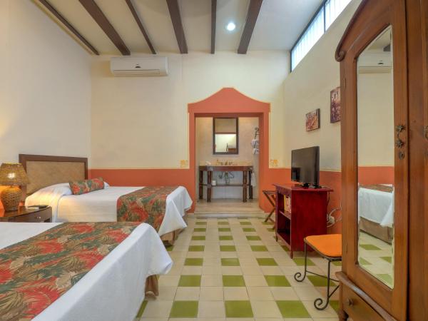 Hotel Luz en Yucatan : photo 4 de la chambre chambre deluxe avec 2 lits queen-size