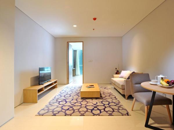 Midtown Residence Surabaya : photo 3 de la chambre hébergement lits jumeaux fabulous