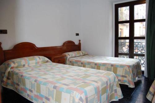 Hostal Noria : photo 1 de la chambre chambre lits jumeaux