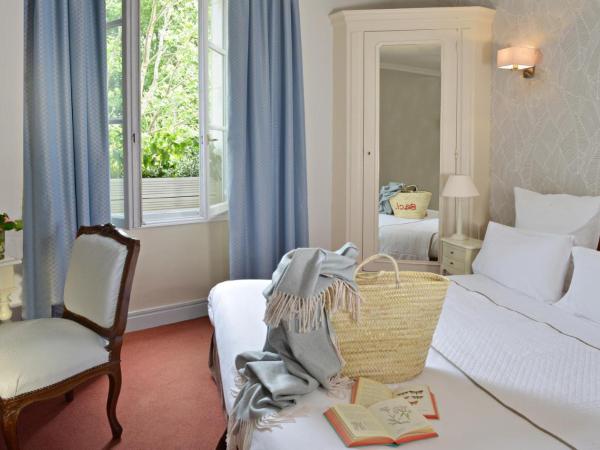 Cit'Hôtel Le Plantagenet : photo 2 de la chambre chambre lits jumeaux standard